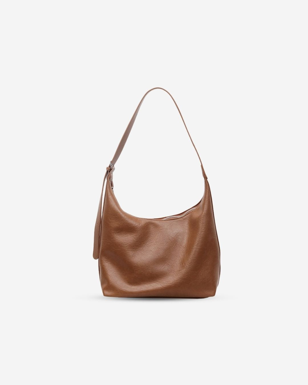 Brown leather handbag on a light gray background