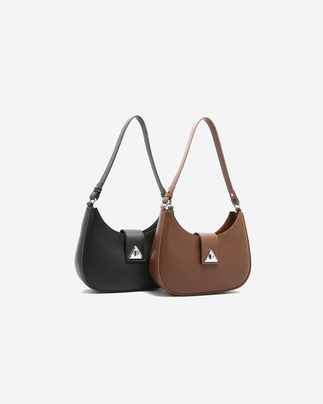 Black and brown handbags with  on a light gray background